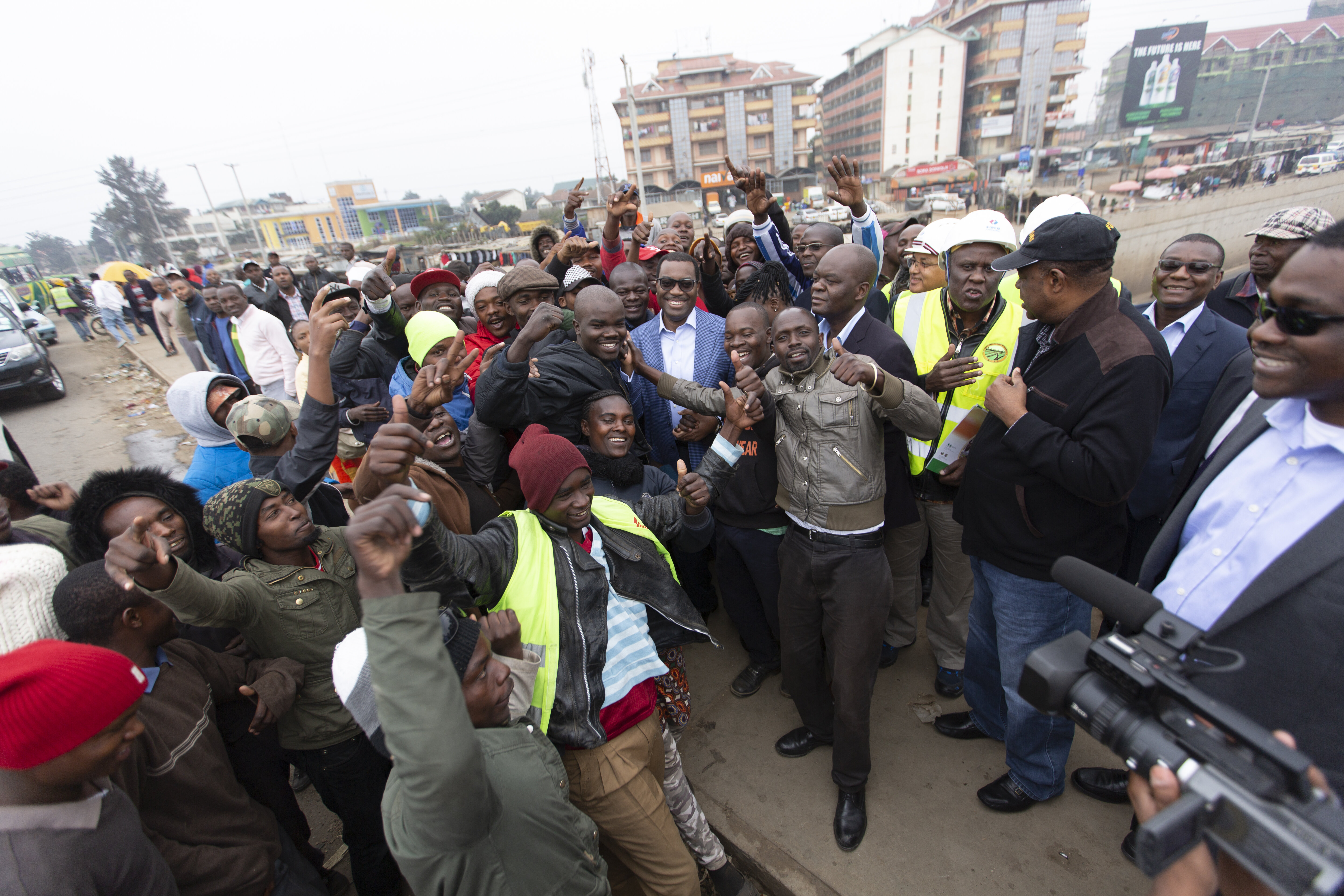 Dr. Adesina interacting with a crowd